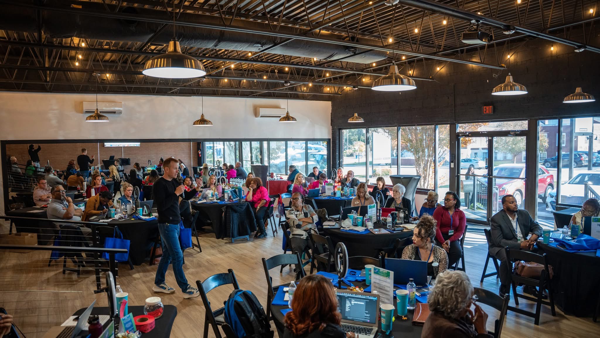 David Colgan speaking to a packed room